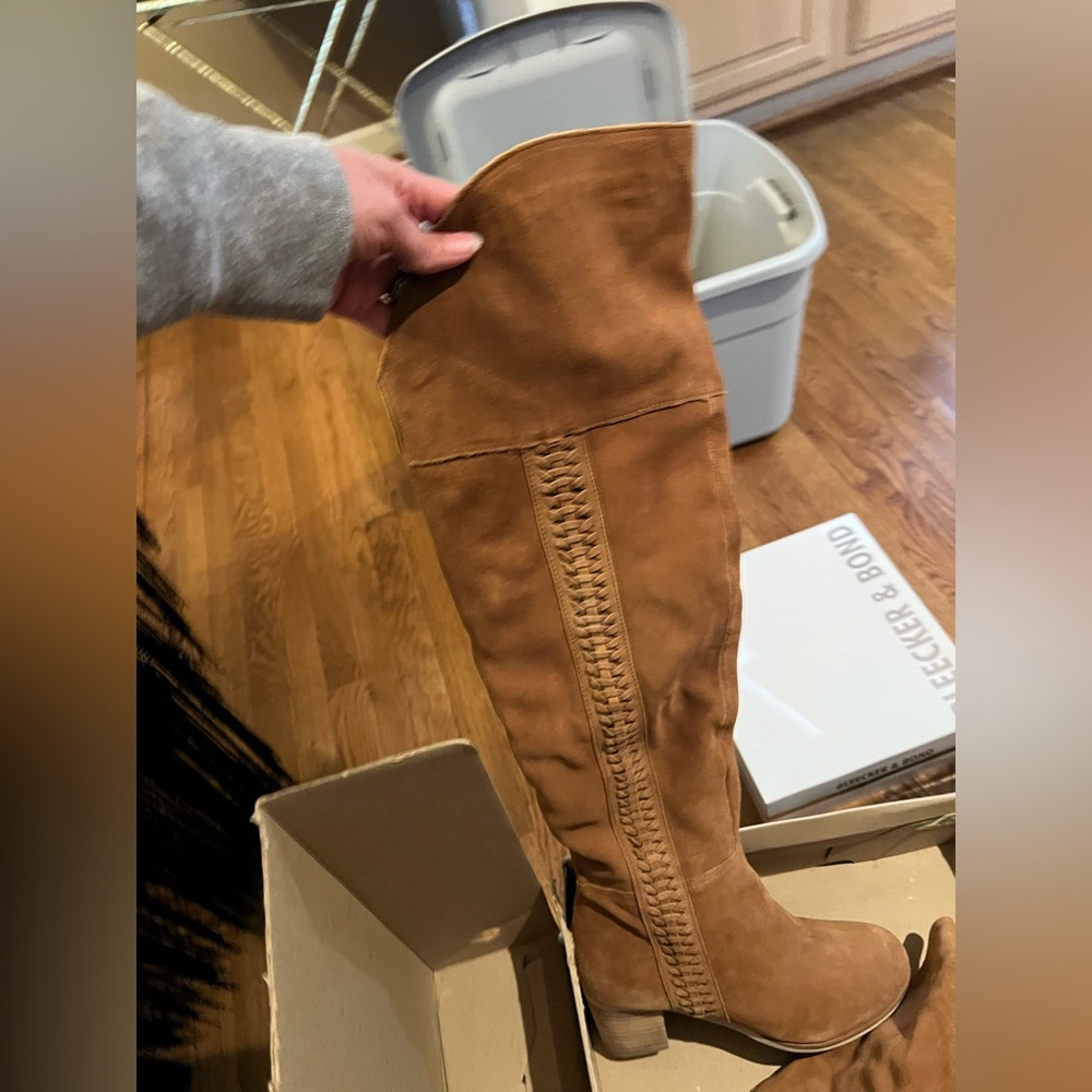 Over the knee suede boots.  Never worn.